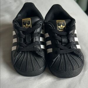 Adidas Kids Black and White Sneakers with Gold Logo